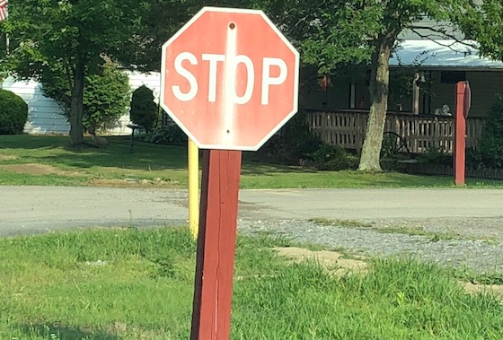 mobile home park faded stop sign